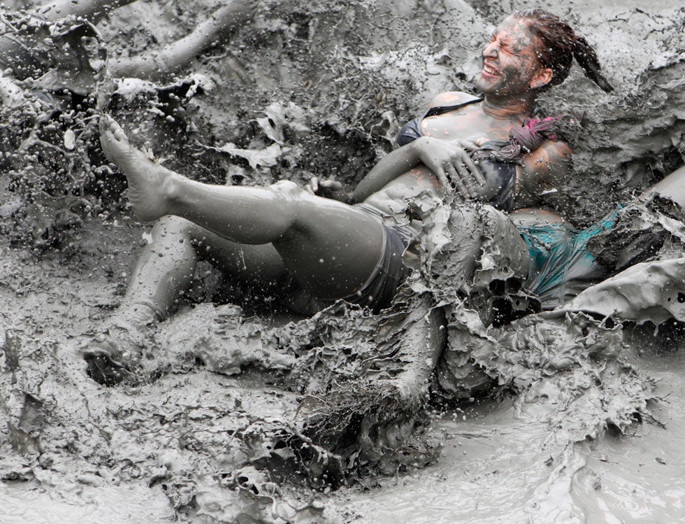 Tourists play in the mud during the opening day of the Boryeong Mud Festival at Daecheon beach in Boryeong, South Korea. Lee Jae Won has been Reuters' chief photographer for Korea since 2002. Check out more of his work on the <a href="http://blogs.reuters.com/jae-won-lee/">Reuters blog</a>. And if you like mud festivals, <a href="http://www.americanphotomag.com/photo-gallery/2012/02/street-photographs-heart-china">see also the work of ERIC</a> who we've recently featured.