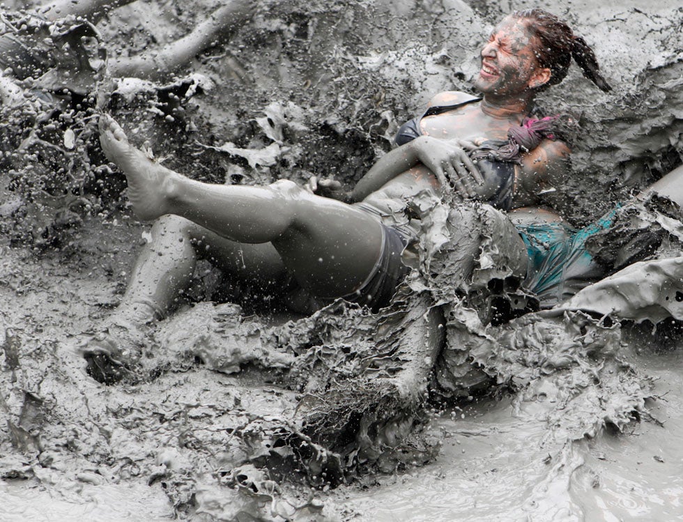 Tourists play in the mud during the opening day of the Boryeong Mud Festival at Daecheon beach in Boryeong, South Korea. Lee Jae Won has been Reuters' chief photographer for Korea since 2002. Check out more of his work on the <a href="http://blogs.reuters.com/jae-won-lee/">Reuters blog</a>. And if you like mud festivals, <a href="http://www.americanphotomag.com/photo-gallery/2012/02/street-photographs-heart-china">see also the work of ERIC</a> who we've recently featured.