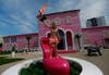 A topless activist from women's rights group Femen protests outside a giant replica of "Barbie's Dreamhouse" in Berlin, Germany. The text on activist's chest reads: 'Life in plastic is not fantastic.' Pawel Kopczynski is a Reuters staff photographer based in Berlin. See more of his work <a href="http://www.americanphotomag.com/photo-gallery/2012/08/photojournalism-week-august-10-2012?page=7">here</a>.