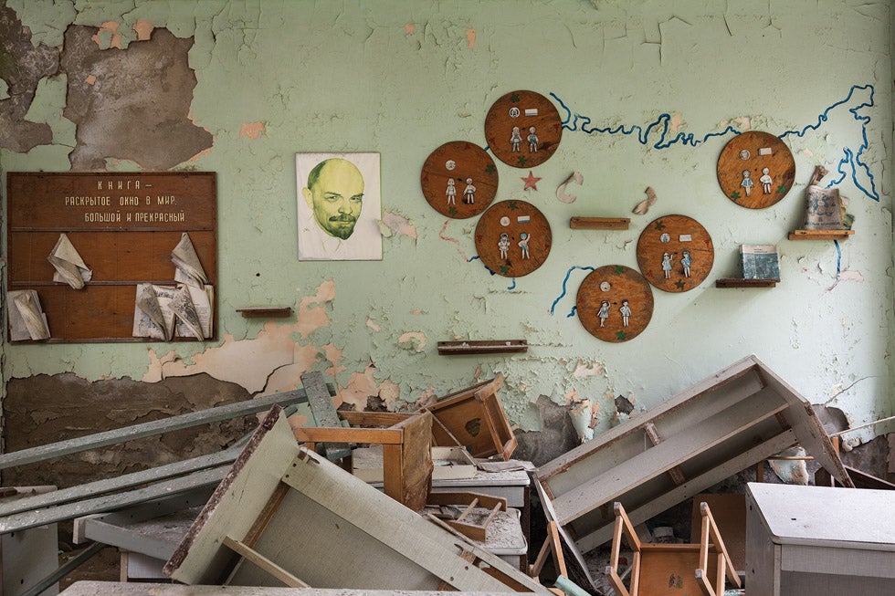 Banners, posters, and drawings glorify the Soviet Union in an abandoned classroom, Pripyat, 2005.
