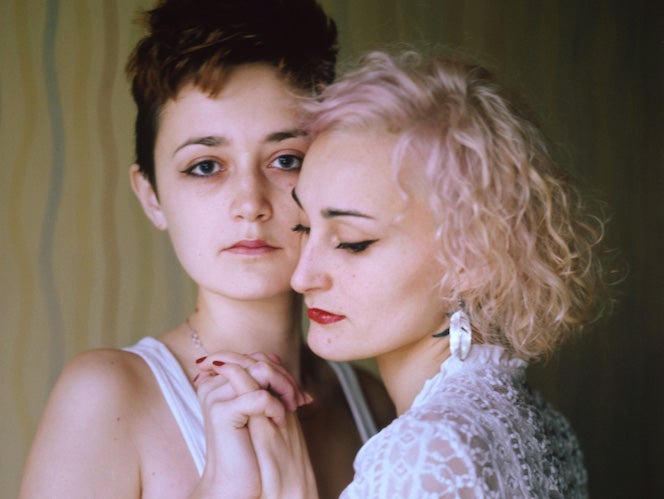 A posed portrait of Lesbian couple ‘O’ (27, right) and ‘D’ (23, left). They were on their way home after a jazz concert, it was late by the time they got off at their subway stop. They were alone as they went up the escalator to get to the street level apart from two men in front of them. As they traveled up to street level, they took each other’s hand and kissed. They came out of the subway and starting walking home. Suddenly ‘O’ felt a blow to the back of her neck: “fucking lesbians” the stranger yelled. He then turned and punched ‘D’ in the face. ‘O’ tried to defend her but was punched in the face too. ‘O’ screamed: “what are you doing? We are just sisters” he replied, “Don’t lie, I saw you kissing and you are spreading LGBT propaganda”. The remark was in reference to the ‘Anti LGBT Propaganda Towards Minors” law recently adopted in Russia. He continued to kick and punch ‘O’ and ‘D’ screaming “No LGBT” and finally “If I see you again I will kill you” and then left. All this time the attackers colleague was filming the attack with his phone. Talking about the attack ‘O’ says: “The real fear I experienced was not for myself, it was for the one I love. The fear struck me when I realized I couldn’t do anything to protect her.” ‘O’ continues: “Now, in Russia, holding hands is dangerous for us. But if the goal of these attackers was to separate us, they failed. They only made our relationship stronger”. St Petersburg, Russia. November 2014. While many countries around the world are legally recognizing same-sex relationships, individuals in nearly 80 countries face criminal sanctions for private consensual relations with another adult of the same sex. Violence and discrimination based on sexual orientation or gender expression is even more widespread. Africa is becoming the worst continent for Lesbian, Gay, Bi-sexual, Transgender, Queer, Inter-sex (LGBTQI) individuals. More than two thirds of