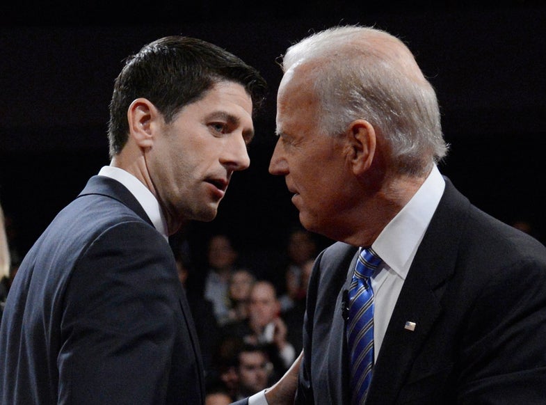 Republican vice-presidential nominee Paul Ryan and U.S. Vice President Joe Biden (R) chat at the conclusion of the U.S. vice presidential debate in Danville, Kentucky, October 11, 2012. REUTERS/Michael Reynolds/POOL (UNITED STATES - Tags: POLITICS ELECTIONS USA PRESIDENTIAL ELECTION)