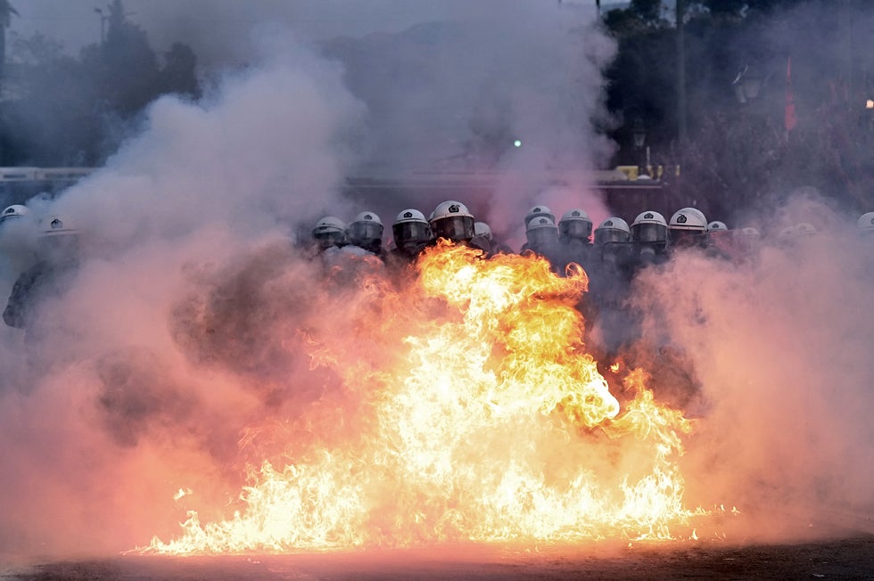 This week saw much violence and destruction in Greece due to rioting, as lawmakers debated an economic austerity plan. AFP photographer Aris Messinis captured this image of riot police holding their ground, as a bomb thrown by protesters explodes right in front of them. Before photographing rioting in Greece, Messinis covered the fall of the Qadaffi regime in Libya for AFP.