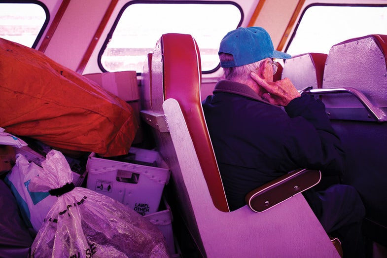 A man rides over to Tangier Island, Virginia on November 8, 2011 on The Mail Boat, the only daily transportation this time of year for the village of roughly 600 people. APH0413_Focus