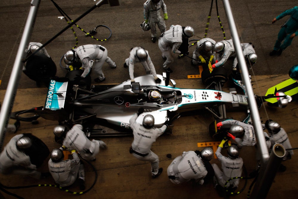 Mercedes driver Lewis Hamilton of Britain gets a pit service during the Spain Formula One Grand Prix at the Barcelona Catalunya racetrack in Montmelo, near Barcelona, Spain on Sunday, May 11, 2014. Emilio Morenatti is an AP staffer and one of the most resilient photojournalists out there. In 2010, he was badly injured by a roadside bomb. He ultimately lost his left foot due to the injuries, but is now back in action making great work. See more of his work <a href="http://www.americanphotomag.com/photo-gallery/2014/03/photojournalism-month-february-2014?page=11">here</a>.