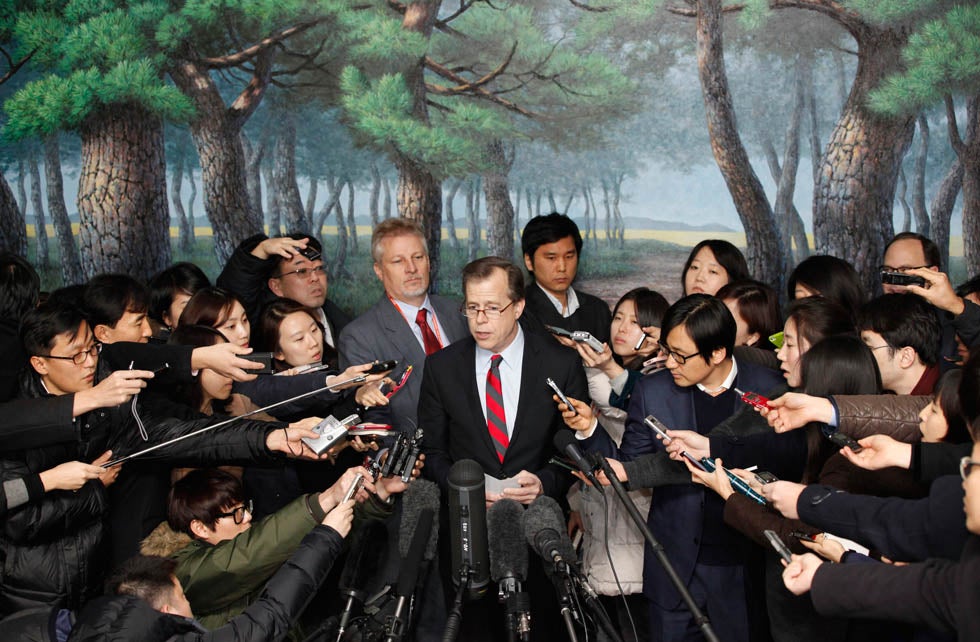 U.S. Special Representative for North Korea Policy Glyn Davies (center) attends a news conference at South Korea's foreign ministry after meeting with South Korea's chief nuclear envoy Lim Sung-nam in Seoul. Kim Hong-Ji is a photojournalist working for Reuters out of South Korea. See more of his work in our past-round up <a href="http://www.americanphotomag.com/photo-gallery/2012/08/photojournalism-week-august-24-2012?page=4">here</a>.