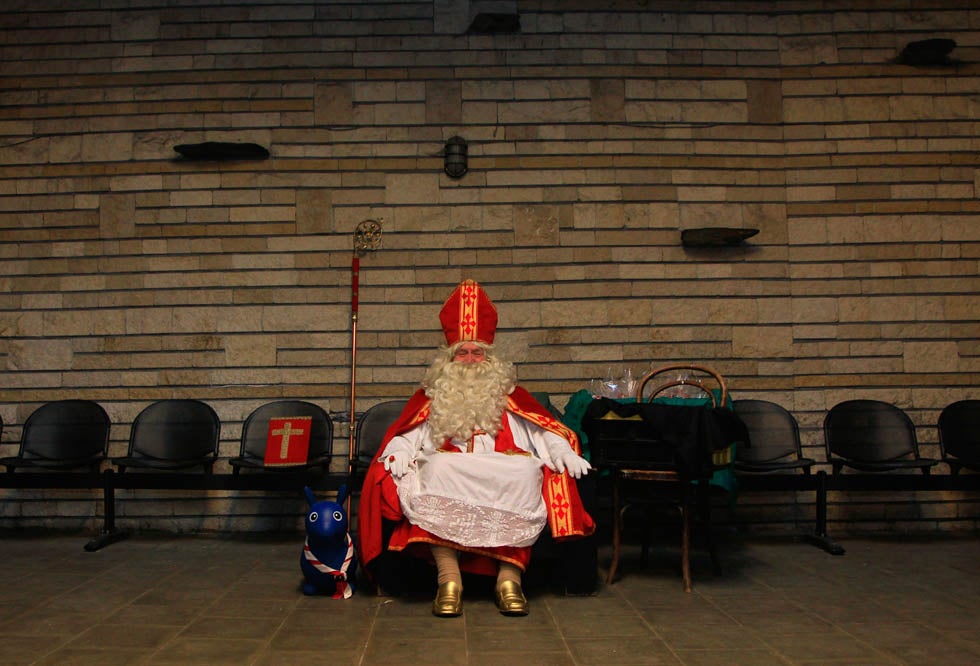 Lievin Pauwels, 72, has been dressing as Saint Nicholas for the past 40 years, to help bring cheer to children in Brussels, Belgium. Yves Herman is a Reuters staffer currently based in Belgium. Check out more of his work <a href="http://blogs.reuters.com/photographers-blog/2012/06/18/a-pitch-side-soaking/">here</a>.