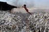 A child jumps on the waste products that are used to make poultry feed as she plays in a tannery at Hazaribagh in Dhaka, Bangladesh. Andrew Biraj is a Reuters staff photographer based out of Dhaka, Bangladesh and the winner of a 2011 World Press Photo award. Check out his image from last week's gallery <a href="http://www.americanphotomag.com/photo-gallery/2012/10/photojournalism-week-october-5-2012?page=7">here</a>.