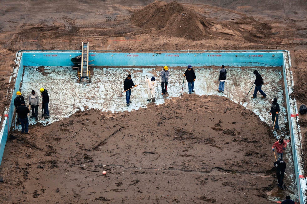 Contractors work to remove sand from a pool located in the Rockaways in New York City, the result of Hurricane Sandy. Lucas Jackson is a New York City-based Reuters staffer who recently arrived back in the States after covering the conflict in Afghanistan. See more of his work in our previous roundups <a href="http://www.americanphotomag.com/photo-gallery/2012/11/photojournalism-week-aftermath-sandy?page=7">here</a> and <a href="http://www.americanphotomag.com/photo-gallery/2012/09/photojournalism-week-september-14-2012-0?page=9">here</a>.