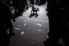 An Orthodox Jewish boy picks up a sticker during a rally organized to welcome Rabbi Zalman Leib Teitelbaum, in Jerusalem. Ronen Zvulun has been working in Israel since 1996 as a photojournalist. He has been with Reuters since 2007. See more of his work <a href="http://www.americanphotomag.com/photo-gallery/2013/01/photojournalism-week-january-4-2013?page=6">here</a>.