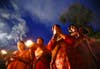 Hindu devotees offer prayers at the Pashupatinath temple as they take part in the "Bol Bom" pilgrimage in Kathmandu, Nepal. The faithful, chanting the name of Lord Shiva, run nine miles barefoot to Pashupatinath temple seeking good health, wealth and happiness. Navesh Chitrakar is a Reuters staffer based in Nepal. This is one of two images Chitrakar has featured in this week's round up. Check out the other later in the gallery and see more of his work on the <a href="http://in.reuters.com/news/pictures/slideshow?articleId=INRTR2TSMC">Reuters blog</a>.