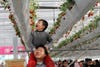Photographer Lintao Zhang was on the scene at the seventh-annual International Strawberry Symposium in Beijing. Also known as paradise for hungry children. Zhang is a full-time Getty Images photographer based in Beijing.