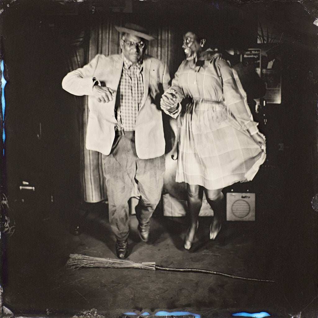 Dom Flemons and Vania Kinard holding hands