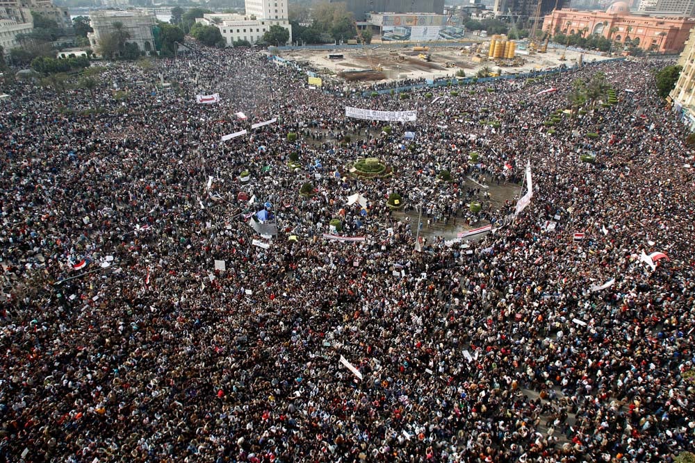 Egyptians rally at Tahrir Square in downtown Cairo February 1, 2011. Hundreds of thousands of Egyptians, from students and doctors to the jobless poor, swamped Cairo on Tuesday in the biggest demonstration so far in an uprising against an increasingly isolated President Hosni Mubarak. Amr Dalsh is a Reuters staffer based in Cairo, Egypt. He has been with the organization since 2006. Check out more of his incredible work in our <a href="http://www.americanphotomag.com/photo-gallery/2012/12/2012-photojournalism-year?page=20">Photojournalism of the Year</a> feature.