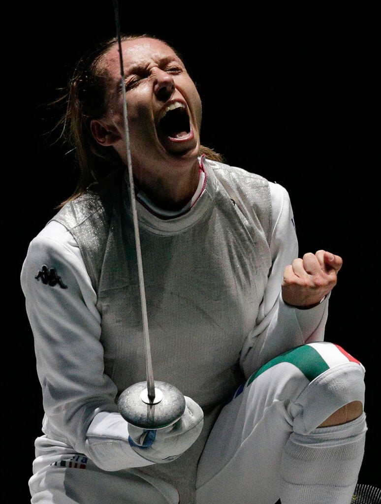 Italy's Valentina Vezzali celebrates defeating South Korea's Nam Hyun Hee during their women's Individual Foil bronze medal fencing competition. Max Rossi is an Italian-based Reuters photographer covering the Olympic Games. He has been shooting for the agency since 2003 and his work mainly concentrates on sports photography.