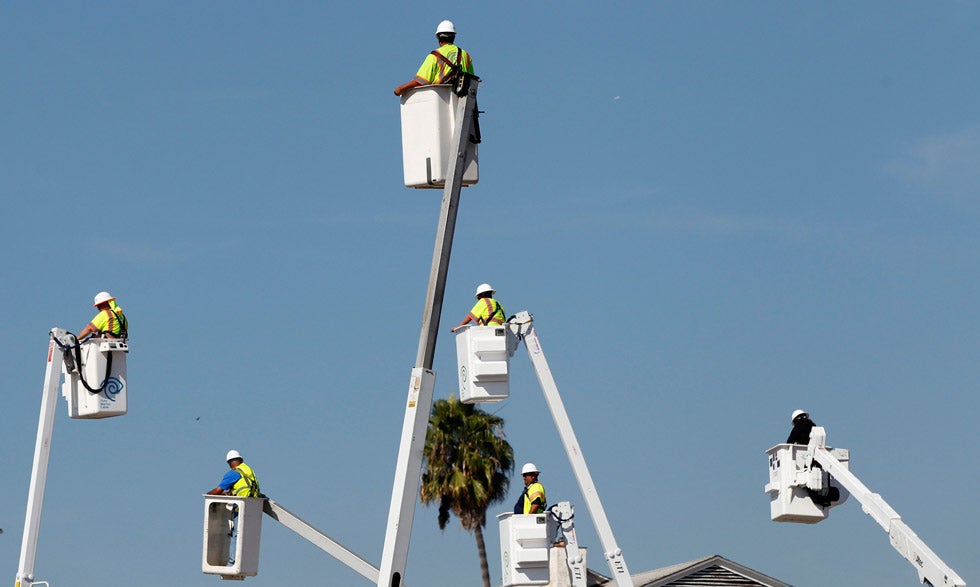 Workers are seen in cherry pickers as the Space Shuttle Endeavour is moved to the California Science Center in Los Angeles. Mario Anzuoni is a LA-based Reuters staffer. See more of his work on his <a href="http://blogs.reuters.com/mario-anzuoni/">site</a>.