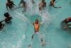 A boy jumps into a swimming pool to cool himself on a hot day in the southern Indian city of Chennai. Babu Babu is a Reuters photographer based in Chennai. See more of his outstanding work in our previous round-ups <a href="http://www.americanphotomag.com/photo-gallery/2013/03/photojournalism-week-march-29-2013?page=1">here</a> and <a href="http://www.americanphotomag.com/photo-gallery/2013/02/photojournalism-week-february-1-2013?page=8">here</a>.