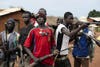 Men claiming to be anti-Balaka fighters, opposed to the Seleka, are seen posing with their weapons in the main street of Njoh, Central African Republic, September 24, 2013.