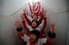 Students exercise during class break in a classroom building on a foggy day in Jinan, Shandong province, China.