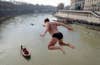An unidentified man dives into the Tiber River from the Cavour bridge, as part of traditional New Year celebrations in Italy. Tony Gentile is a Reuters staffer based in Europe. See more of his work <a href="http://www.americanphotomag.com/photo-gallery/2012/06/photojournalism-week-june-29-2012?page=6">here</a>.