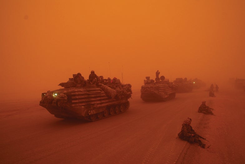FILE -- A severe sandstorm blanketed a convoy from the Headquarters Battalion of the 1st Marine Division north of the Euphrates River in Iraq, on March 25, 2003. President Barack Obama announced Oct. 21, 2011, that the United States had fulfilled its commitment in Iraq and would bring all U.S. troops home by the end of the year. (Ozier Muhammad/The New York Times) EDS NOTE: PHOTO HAS ORANGE OVERCAST BECAUSE OF SAND STORM - DO NOT COLOR-CORRECT