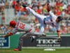 This impressive high-speed fast-shutter image, captured during a Red Sox vs Cardinals spring training game, was shot by Reuters photographer Steve Nesius. A former photo editor for the Associated Press, Nesius now covers a wide range of photographic assignments in the Tampa Bay-area for a variety of clients, including Reuters.
