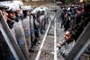 Protests have continued this week in Egypt, calling for improvements in police protection after 74 football fans died in violence at a match earlier this month. Getty Images contributing photographer <a href="http://www.carsten-koall.com/">Carsten Koall</a> made this image of a boy looking up at police officers during a march in Cairo. You may recall Koall's memorable image of a protester and his tear gas canisters from <a href="http://www.americanphotomag.com/photo-gallery/2012/02/best-photojournalism-week-february-3-2012">last week's roundup</a>, as he continues to file amazing work from Egypt.