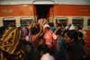 Women try to enter the ladies' compartment of a crowded train heading towards Delhi at Noli Railway Station in Utter Pradesh, India. The role and treatment of women in society has recently become a hot political issue in the country, since the Dec. 16 gang rape of a 23-year-old student in New Delhi, who later died of her injuries. Navesh Chitrakar is a Reuters staffer based in Nepal. His work has appeared in our weekly roundup more than any other photographer. See more of his images <a href="http://www.americanphotomag.com/photo-gallery/2012/10/photojournalism-week-october-5-2012?page=1">here</a> and <a href="http://www.americanphotomag.com/photo-gallery/2012/09/photojournalism-week-september-28-2012?page=7">here</a>.