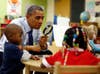 U.S. President Barack Obama uses a magnifying glass to play a game with children in a pre-kindergarten classroom at College Heights early childhood learning center in Decatur, Georgia. Jason Reed is a Reuters staffer who covers President Obama. See more of his work <a href="http://www.americanphotomag.com/photo-gallery/2012/09/photojournalism-week-september-28-2012?page=4">here</a>.