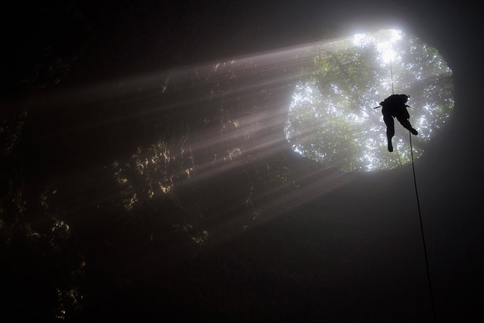 A student from the University of Indonesia descends into Jomblang cave near the ancient city of Yogyakarta, Indonesia. Dwi Oblo is a freelance photographer working for Reuters. Keep up to date with his daily work by following him on <a href="https://twitter.com/#!/dwioblo">Twitter</a> (you will need to translate).