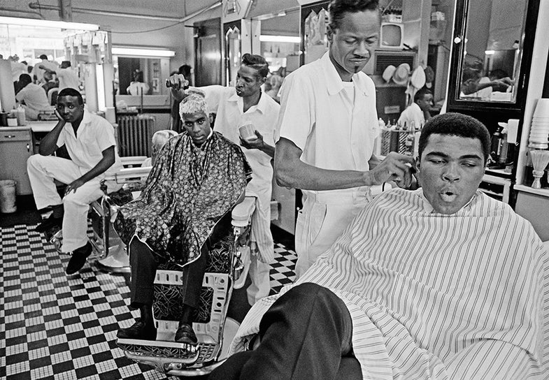 USA, Chicago, Illinois, 1966. MUHAMMAD ALI. In a barbier shop.