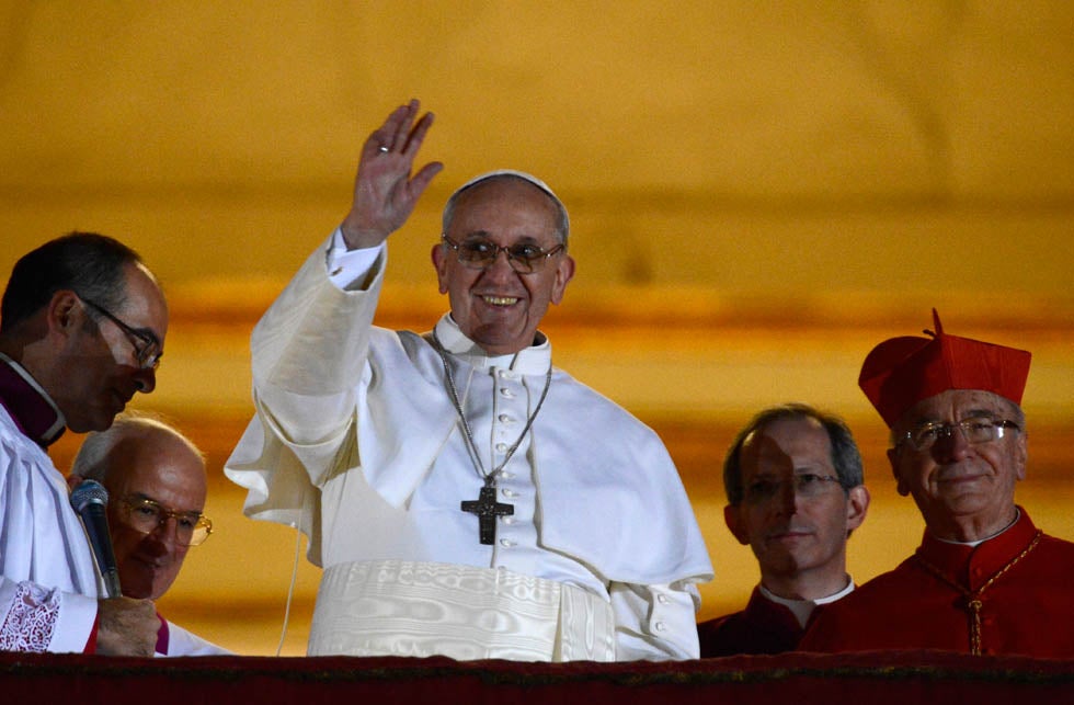 Newly elected Pope Francis, Cardinal Jorge Mario Bergoglio of Argentina appears on the balcony of St. Peter's Basilica after being elected by the conclave of cardinals, at the Vatican. Dylan Martinez is a Reuters staffer based in the UK. He made this photo with the insanely exspensive Nikkor 1200-1700mm f/5.6-8P IF-ED lens. You can read more about the photo and lens used to take it over on <a href="https://www.popphoto.com/gear/2013/03/heres-reporter-using-insane-nikon-1200-1700mm-to-photograph-new-pope/?src=DOM&amp;soc=FB">Pop Photo</a>.