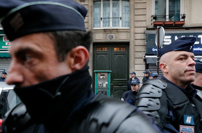 Riot police secure the entrance of the Information Centre of Kurdistan in Paris, France, after three female Kurdish members of the PKK rebel group were found shot dead on January 10, 2013. Christian Hartmann is a Reuters staffer based in central Europe. See more of his work <a href="http://www.americanphotomag.com/photo-gallery/2012/11/photojournalism-week-november-9-2012?page=7">here</a>.