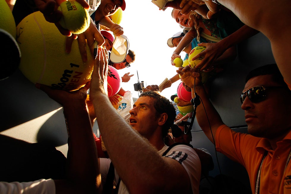 Andy Murray of Britain signs autographs after defeating Feliciano Lopez of Spain in their men's singles match at the U.S. Open tennis tournament in New York. Eduardo Munoz is a Reuters staffer currently based in New York City. Throughout his career, he covered the regions of Haiti, Columbia and the Dominican Republic. See more of his work on his <a href="http://www.eduardomunozphoto.com/">site</a>.