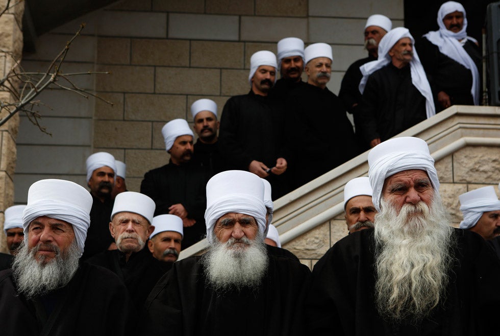 Members of the Druze community take part in a rally in the village of Majdal Shams, which stands at the heart of a long-standing conflict between Israel and Syria. Hundreds of community members participated in the event, marking the 32nd anniversary of Israel's annexation of the strategic plateau, which it captured in the 1967 Middle East War. Baz Ratner is a veteran conflict photographer and staffer for Reuters. He was a Pulitzer Prize finalist in 2006 for his work covering the military conflict in Lebanon. You can see more of his work on his <a href="http://www.bazratner.com/index.php?bg=33">personal site</a>.
