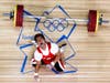 South Korea's Jaehyouk Sa shouts after injuring his arm during the men's 77Kg Group A weightlifting competition. Grigory Dukor is a Reuters staff photographer covering the 2012 Olympic Games.