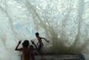 Eastern Timorese children run as water hits a seawall at Dili Beach on the tiny nation's north coast. Reuters photographer Beawiharta, who made this image, often updates his blog page on the Reuters' Website, you can keep up to date with his shooting adventures <a href="http://blogs.reuters.com/beawiharta/">here</a>.