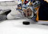 Associate press Photographer Gregory Bull captured this photo of Buffalo Sabres goalie Ryan Miller staring at a puck he had just stopped during an NHL game against the Anaheim Ducks. Bull has been shooting for the Associated press since 1996, and has worked in Mexico, Japan, Haiti and all over the United States.