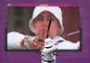 Mexico's Aida Roman competes as she is seen on a large screen during the women's individual archery final. Suhaib Salem is a Reuters photographer covering the 2012 Olympics. However, right up until the start of the Games, he was covering the presidential elections in Egypt.