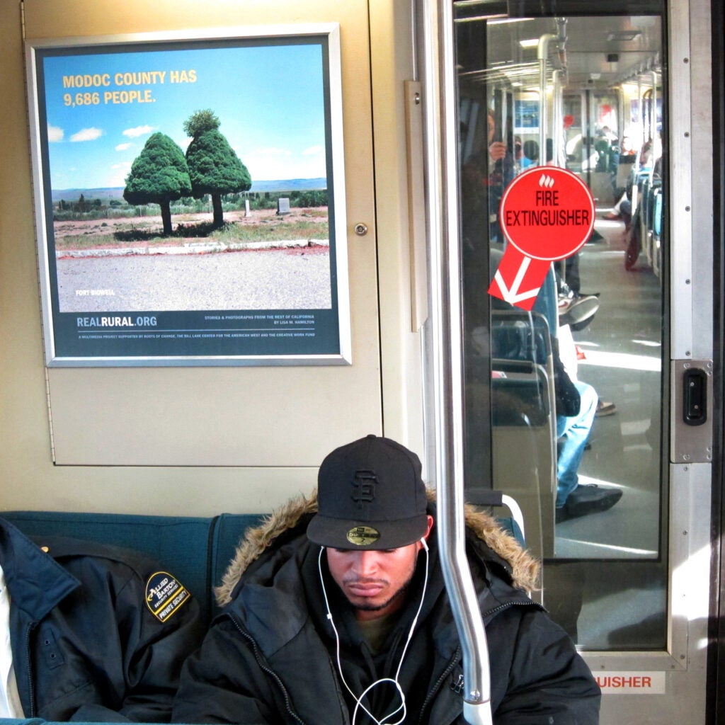 A Real Rural poster on BART