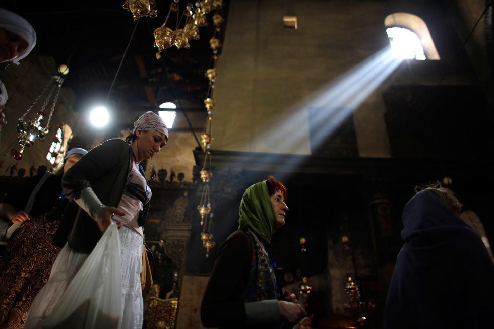 Christian worshippers visit the Church of the Nativity, revered as the site of Jesus' birth, in the West Bank town of Bethlehem. Ammar Awad is a Reuters staffer based in Palestine. See more of his work <a href="http://www.americanphotomag.com/photo-gallery/2012/09/photojournalism-week-september-14-2012-0?page=2">here</a>.