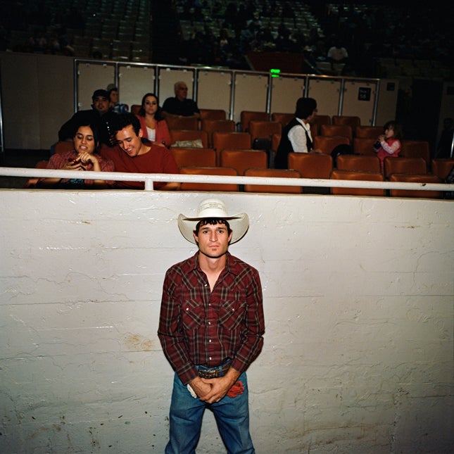 Bull rider Keith Roquemore, Grand National Rodeo. Daly City, San Mateo County