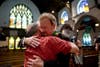 United Methodist pastor Frank Schaefer, right, hugs the Rev. David Wesley Brown after a news conference Tuesday, June 24, 2014, at First United Methodist Church of Germantown in Philadelphia. Schaefer, who presided over his son's same-sex wedding ceremony and vowed to perform other gay marriages if asked, can return to the pulpit after a United Methodist Church appeals panel on Tuesday overturned a decision to defrock him. Matt Rourke is an Associated Press Staff Photographer based in Philadelphia. More of his work can be seen <a href="http://bigstory.ap.org/tags/matt-rourke">here. </a>