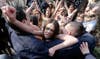 Activists from the women's rights group Femen struggle with police officers during a protest in Paris. The protest was organized in support of a Tunisian activist who received threats after she posted topless pictures on the Internet, organizers said. Jacky Naegelen is a French-based photographer. See more of her work <a href="http://www.naegelen.com/">here</a>.