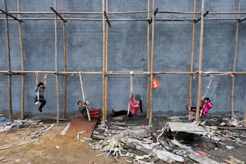 Children play on self-made swings on scaffolding at a construction site in Tongxiang, Zhejiang province, China. William Hong is a Reuters photojournalist working in the eastern portion of China.