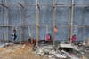 Children play on self-made swings on scaffolding at a construction site in Tongxiang, Zhejiang province, China. William Hong is a Reuters photojournalist working in the eastern portion of China.