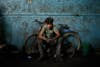 Palestinian Mohammed Jundeya, 17, poses for a photograph in a car repair garage in Gaza City. Jundeya left school to work as an apprentice in the garage so that he could support his family's income. Mohammed Salem is a Reuters photographer based in Palestine. See more of his work in our past <a href="http://www.americanphotomag.com/photo-gallery/2013/04/photojournalism-week-april-12-2013?page=3">round-up</a>.