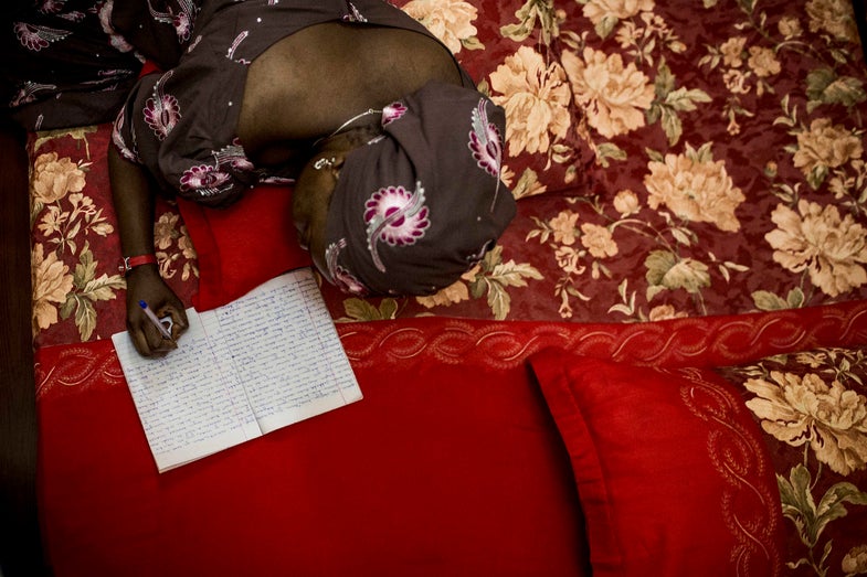 Hadiza Sani Garba writes her novels in bed or in her sitting room, by hand, in small composition books.