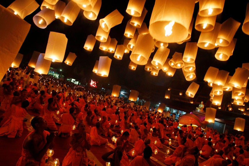 Buddhist monks release paper lanterns into the sky in Suphan Buri province, Thailand. The lanterns were released during a traditional pilgrimage to pay homage to Lord Buddha and bless Thailand as it enters the new year. Sukree Sukplang is a Reuters photographer based in Thailand.