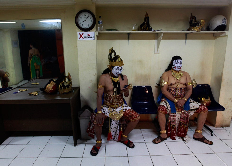Traditional Wayang Orang dancers sit backstage as they wait for their performance during a show at the Bharata Theatre in Jakarta, Indonesia. Beawiharta Beawiharta is a Reuters staffer based in Indonesia. Check out more of his work over on the <a href="http://blogs.reuters.com/beawiharta/">Reuters blog</a>.